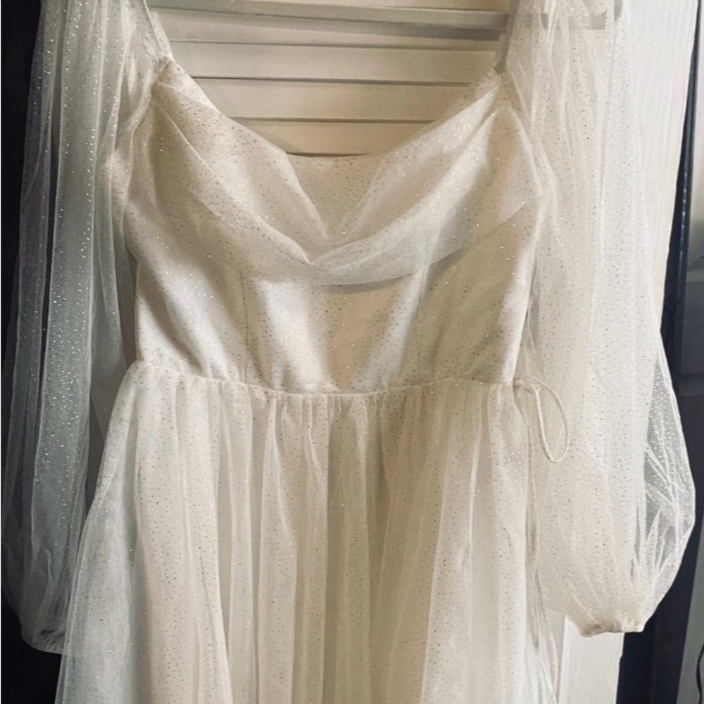 Elegant Long Sleeve Cream Dress with Sheer Accents